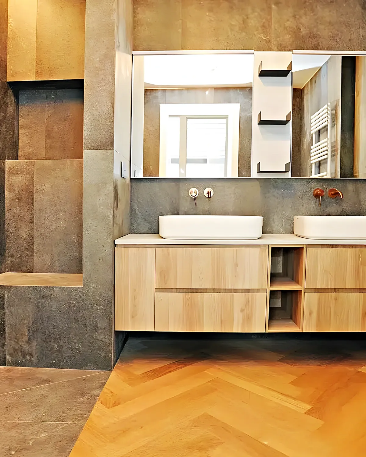 Renovated bathroom in grey stone with a wooden vanity and double basin in Vilanova i la Geltrú
